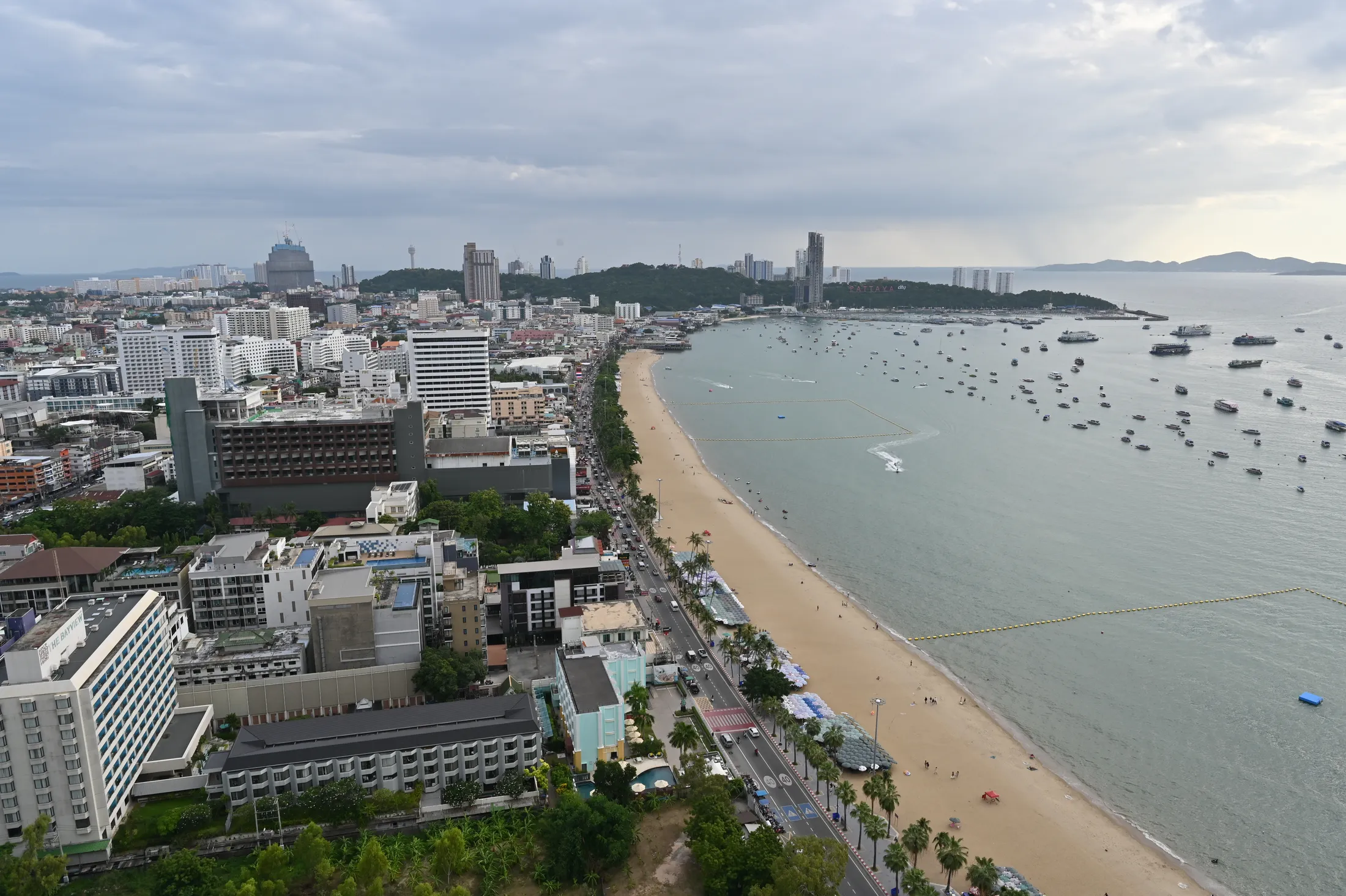 Pattaya bay from the air, the crescent of beach and Beach Road behind it